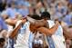 Jan 10, 2013; Chapel Hill, NC, USA; North Carolina Tar Heels players huddle including forwards James Michael McAdoo (43) and Reggie Bullock (35) in the first half at the Dean E. Smith Center. Mandatory Credit: Bob Donnan-USA TODAY Sports