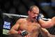 Dec 29, 2012; Las Vegas, NV, USA; Cain Velasquez (right) strikes Junior Dos Santos (left) during UFC 155 at the MGM Grand Garden Arena. Mandatory Credit: Gary A. Vasquez-USA TODAY Sports