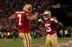 SAN FRANCISCO, CA - JANUARY 12: Quarterback Colin Kaepernick #7 of the San Francisco 49ers celebrates with wide receiver Michael Crabtree #15 after running the ball for a touchdown against the Green Bay Packers in the third quarter during the NFC Divisional Playoff Game at Candlestick Park on January 12, 2013 in San Francisco, California. (Photo by Stephen Dunn/Getty Images)