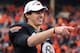 Jan 1, 2013; Dallas, TX, USA; Oklahoma State Cowboys quarterback Clint Chelf (10) receives the MVP award after the game against the Purdue Boilermakers at the Cotton Bowl. The Cowboys beat the Boilermakers 58-14. Mandatory Credit: Matthew Emmons-USA TODAY Sports