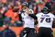 DENVER, CO - JANUARY 12: Joe Flacco #5 of the Baltimore Ravens throws a 32-yard touchdown pass to Torrey Smith #82 in the second quarter against the Denver Broncos during the AFC Divisional Playoff Game at Sports Authority Field at Mile High on January 12, 2013 in Denver, Colorado. (Photo by Doug Pensinger/Getty Images)
