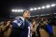 FOXBORO, MA - JANUARY 13: Tom Brady #12 of the New England Patriots walks on the field after defeating the Houston Texans by a score of 41-28 to win the 2013 AFC Divisional Playoffs game at Gillette Stadium on January 13, 2013 in Foxboro, Massachusetts. (Photo by Elsa/Getty Images)