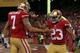 SAN FRANCISCO, CA - JANUARY 12: Quarterback Colin Kaepernick #7 of the San Francisco 49ers celebrates with running back LaMichael James #23 after running the ball for a touchdown against the Green Bay Packers in the third quarter during the NFC Divisional Playoff Game at Candlestick Park on January 12, 2013 in San Francisco, California. (Photo by Stephen Dunn/Getty Images)