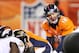 Jan 12, 2013; Denver, CO, USA; Denver Broncos quarterback Peyton Manning (18) lines up during the fourth quarter of the AFC divisional round playoff game against the Baltimore Ravens at Sports Authority Field. The Ravens won 38-35 in double overtime. Mandatory Credit: Chris Humphreys-USA TODAY Sports