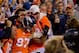DENVER, CO - OCTOBER 28: Wide receiver Eric Decker #87 of the Denver Broncos celebrates in the stands with fans after scoring a touchdown during the second quarter against the New Orleans Saints at Sports Authority Field Field at Mile High on October 28, 2012 in Denver, Colorado. (Photo by Justin Edmonds/Getty Images)