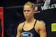 August 18, 2012; San Diego, CA, USA; Ronda Rousey (black shorts) in the cage to start her fight against Sarah Kaufman (not pictured) during their Strikeforce MMA women's bantamweight title bout at the Valley View Casino Center. Rousey won in 54 seconds of the first round. Mandatory Credit: Jayne Kamin-Oncea-USA TODAY Sports