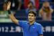 SHANGHAI, CHINA - OCTOBER 12: Roger Federer of Switzerland acknowledges the crowd after his win over Marin Cilic of Croatia during the Shanghai Rolex Masters at the Qi Zhong Tennis Center on October 12, 2012 in Shanghai, China. (Photo by Matthew Stockman/Getty Images)