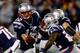 FOXBORO, MA - JANUARY 13: Tom Brady #12 of the New England Patriots hands the ball off to Stevan Ridley #22 during the 2013 AFC Divisional Playoffs game at Gillette Stadium on January 13, 2013 in Foxboro, Massachusetts. (Photo by Jared Wickerham/Getty Images)