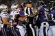 BALTIMORE, MD - SEPTEMBER 23: An NFL replacement ref tries to break up Baltimore Ravens and New England Patriots players at M&T Bank Stadium on September 23, 2012 in Baltimore, Maryland. (Photo by Patrick Smith/Getty Images)