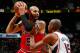 ATLANTA, GA - DECEMBER 22: Al Horford #15 of the Atlanta Hawks defends against Carlos Boozer #5 of the Chicago Bulls at Philips Arena on December 22, 2012 in Atlanta, Georgia. NOTE TO USER: User expressly acknowledges and agrees that, by downloading and or using this photograph, User is consenting to the terms and conditions of the Getty Images License Agreement. (Photo by Kevin C. Cox/Getty Images)