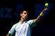 MELBOURNE, AUSTRALIA - JANUARY 14: Novak Djokovic of Serbia serves in his first round match against Paul-Henri Mathieu of France during day one of the 2013 Australian Open at Melbourne Park on January 14, 2013 in Melbourne, Australia. (Photo by Michael Dodge/Getty Images)