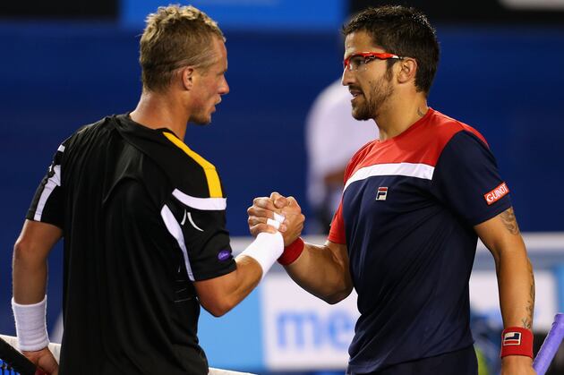 Tattooed Tipsarevic Eliminates Hewitt in 1st Round
