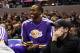 Jan 9, 2013; San Antonio, TX, USA; Los Angeles Lakers center Dwight Howard (12) watches from the bench during the fourth quarter against the San Antonio Spurs at the AT&T Center. The Spurs won 108-105. Mandatory Credit: Soobum Im-USA TODAY Sports