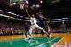 BOSTON, MA - JANUARY 14: Rajon Rondo #9 of the Boston Celtics goes up for a layup in front of Hakim Warrick #21 of the Charlotte Bobcats during the game on January 14, 2013 at TD Garden in Boston, Massachusetts. NOTE TO USER: User expressly acknowledges and agrees that, by downloading and or using this photograph, User is consenting to the terms and conditions of the Getty Images License Agreement. (Photo by Jared Wickerham/Getty Images)