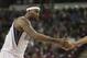 Jan 10, 2013; Sacramento, CA, USA; Sacramento Kings center DeMarcus Cousins (15) fives a teammate after the play against the Dallas Mavericks during the overtime period at Sleep Train Arena. The Dallas Mavericks defeated the Sacramento Kings 117-112 in overtime. Mandatory Credit: Kelley L Cox-USA TODAY Sports