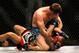 ATLANTA, GA - APRIL 21: Rory MacDonald (top) punches Che Mills during their welterweight bout for UFC 145 at Philips Arena on April 21, 2012 in Atlanta, Georgia. (Photo by Kevin C. Cox/Getty Images)