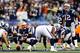 FOXBORO, MA - JANUARY 13: Tom Brady #12 of the New England Patriots makes an adjustment against the Houston Texans during the 2013 AFC Divisional Playoffs game at Gillette Stadium on January 13, 2013 in Foxboro, Massachusetts. (Photo by Jared Wickerham/Getty Images)