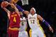 January 13, 2013; Los Angeles, CA, USA; Los Angeles Lakers center Dwight Howard (12) and small forward Earl Clark (6) defend against Cleveland Cavaliers small forward Luke Walton (4) during the second half at Staples Center. Mandatory Credit: Gary A. Vasquez-USA TODAY Sports