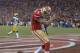 Jan 12, 2013; San Francisco, CA, USA; San Francisco 49ers quarterback Colin Kaepernick (7) celebrates after scoring a touchdown against the Green Bay Packers during the third quarter of the NFC divisional round playoff game at Candlestick Park. Mandatory Credit: Kirby Lee-USA TODAY Sports