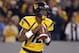 MORGANTOWN, WV - NOVEMBER 17: Geno Smith #12 of the West Virginia Mountaineers drops back to pass against the Oklahoma Sooners during the game on November 17, 2012 at Mountaineer Field in Morgantown, West Virginia. (Photo by Justin K. Aller/Getty Images)