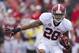 FAYETTEVILLE, AR - SEPTEMBER 15: Dee Milliner #28 of the Alabama Crimson Tide runs the ball against the Arkansas Razorbacks at Razorback Stadium on September 15, 2012 in Fayetteville, Arkansas. The Crimson Tide defeated the Razorbacks 52-0. (Photo by Wesley Hitt/Getty Images)