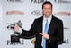 LAS VEGAS, NV - NOVEMBER 30: UFC announcer/commentator Mike Goldberg jokes around as he holds Joe Rogan's MMA Personality of the Year award at the Fighters Only World Mixed Martial Arts Awards 2011 at The Pearl concert theater at the Palms Casino Resort November 30, 2011 in Las Vegas, Nevada. (Photo by Ethan Miller/Getty Images)