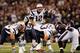 BALTIMORE, MD - SEPTEMBER 23: Quarterback Tom Brady #12 of the New England Patriots signals from the line of scrimmage against the Baltimore Ravens at M&T Bank Stadium on September 23, 2012 in Baltimore, Maryland. (Photo by Rob Carr/Getty Images)