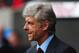 SWANSEA, WALES - JANUARY 06: Arsene Wenger manager of Arsenal looks thoughtful prior to the FA Cup with Budweiser Third Round match between Swansea City and Arsenal at Liberty Stadium on January 6, 2013 in Swansea, Wales. (Photo by Stu Forster/Getty Images)