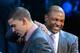 June 28, 2012; Newark, NJ, USA; Austin Rivers (Duke), left, gets a pat on the back from his father and Boston Celtics head coach Doc Rivers after being introduced as the number ten overall pick to the New Orleans Hornets during the 2012 NBA Draft at the Prudential Center. Mandatory Credit: Jerry Lai-USA TODAY Sports