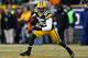 GREEN BAY, WI - JANUARY 05: Wide receiver Greg Jennings #85 of the Green Bay Packers runs after a catch against the Minnesota Vikings during the NFC Wild Card Playoff game at Lambeau Field on January 5, 2013 in Green Bay, Wisconsin. (Photo by Jonathan Daniel/Getty Images)