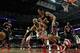 CHICAGO, IL - JANUARY 14: Taj Gibson #22 of the Chicago Bulls and Devin Harris #34 of the Atlanta Hawks chase down a loose ball at the United Center on January 14, 2013 in Chicago, Illinois. NOTE TO USER: User expressly acknowledges and agrees that, by downloading and or using this photograph, User is consenting to the terms and conditions of the Getty Images License Agreement. (Photo by Jonathan Daniel/Getty Images)