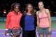 ISTANBUL, TURKEY - OCTOBER 28: Serena Williams of the United States and Maria Sharapova of Russia pose at the net with Mary Pierce of France before the final of the TEB BNP Paribas WTA Championships at the Sinan Erdem Dome October 28, 2012 in Istanbul, Turkey. (Photo by Matthew Stockman/Getty Images)