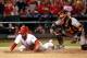 ST LOUIS, MO - OCTOBER 18: Matt Carpenter #13 of the St. Louis Cardinals slides past the plate as he is safe as catcher Hector Sanchez #29 of the San Francisco Giants dropped the ball in the fifth inning in Game Four of the National League Championship Series at Busch Stadium on October 18, 2012 in St Louis, Missouri. (Photo by Dilip Vishwanat/Getty Images)