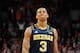 COLUMBUS, OH - JANUARY 13: Trey Burke #3 of the Michigan Wolverines grimaces after missing a three point shot with 14 seconds left in the game against the Ohio State Buckeyes that would have given Michigan the lead on January 13, 2013 at Value City Arena in Columbus, Ohio. Ohio State defeated Michigan 56-53. (Photo by Jamie Sabau/Getty Images)