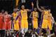 LOS ANGELES, CA - JANUARY 15: Dwight Howard #12 of the Los Angeles Lakers celebrates his basket and foul with Metta World Peace #15, Kobe Bryant #24 and Earl Clark #6 during a 104-88 win over the Milwaukee Bucks at Staples Center on January 15, 2013 in Los Angeles, California. NOTE TO USER: User expressly acknowledges and agrees that, by downloading and or using this photograph, User is consenting to the terms and conditions of the Getty Images License Agreement. (Photo by Harry How/Getty Images)