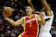 HOUSTON, TX - DECEMBER 31: Jeremy Lin #9 of the Houston Rockets takes a shot over Al Horford #15 of the Atlanta Hawks at the Toyota Center on December 31, 2012 in Houston, Texas. NOTE TO USER: User expressly acknowledges and agrees that, by downloading and or using this photograph, User is consenting to the terms and conditions of the Getty Images License Agreement. (Photo by Scott Halleran/Getty Images)
