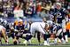 FOXBORO, MA - JANUARY 13: Tom Brady #12 of the New England Patriots makes an adjustment against the Houston Texans during the 2013 AFC Divisional Playoffs game at Gillette Stadium on January 13, 2013 in Foxboro, Massachusetts. (Photo by Jared Wickerham/Getty Images)