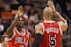 PHOENIX, AZ - NOVEMBER 14: Luol Deng #9 and Carlos Boozer #5 of the Chicago Bulls high five after scoring against the Phoenix Suns during the NBA game at US Airways Center on November 14, 2012 in Phoenix, Arizona. The Bulls defeated the Suns 112-106 in overtime. NOTE TO USER: User expressly acknowledges and agrees that, by downloading and or using this photograph, User is consenting to the terms and conditions of the Getty Images License Agreement. (Photo by Christian Petersen/Getty Images)