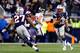 FOXBORO, MA - JANUARY 13: Rob Ninkovich #50 of the New England Patriots runs with the ball after an interception against the Houston Texans during the 2013 AFC Divisional Playoffs game at Gillette Stadium on January 13, 2013 in Foxboro, Massachusetts. (Photo by Jared Wickerham/Getty Images)