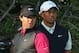 ABU DHABI, UNITED ARAB EMIRATES - JANUARY 17: Rory McIlroy of Northern Ireland (left) and Tiger Woods of the USA in action during the first round of The Abu Dhabi HSBC Golf Championship at Abu Dhabi Golf Club on January 17, 2013 in Abu Dhabi, United Arab Emirates. (Photo by Andrew Redington/Getty Images)