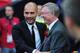 LONDON, ENGLAND - MAY 28: Josep Guardiola manager of FC Barcelona (L) greets Sir Alex Ferguson manager of Manchester United ahead of the UEFA Champions League final between FC Barcelona and Manchester United FC at Wembley Stadium on May 28, 2011 in London, England. (Photo by Shaun Botterill/Getty Images)