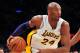 January 13, 2013; Los Angeles, CA, USA; Los Angeles Lakers shooting guard Kobe Bryant (24) moves the ball against the Cleveland Cavaliers during the second half at Staples Center. Mandatory Credit: Gary A. Vasquez-USA TODAY Sports