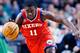 Dec 21, 2012; Philadelphia, PA, USA; Philadelphia 76ers guard Jrue Holiday (11) pushes the ball up court during the third quarter against the Atlanta Hawks at the Wells Fargo Center. The Sixers defeated the Hawks 99-80. Mandatory Credit: Howard Smith-USA TODAY Sports