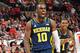 COLUMBUS, OH - JANUARY 13: Tim Hardaway Jr. #10 of the Michigan Wolverines celebrates after drawing a foul in the second half against the Ohio State Buckeyes on January 13, 2013 at Value City Arena in Columbus, Ohio. Ohio State defeated Michigan 56-53. (Photo by Jamie Sabau/Getty Images)