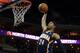 CHARLOTTE, NC - JANUARY 15: Paul George #24 of the Indiana Pacers dunks the ball during their game against the Charlotte Bobcats at Time Warner Cable Arena on January 15, 2013 in Charlotte, North Carolina. NOTE TO USER: User expressly acknowledges and agrees that, by downloading and or using this photograph, User is consenting to the terms and conditions of the Getty Images License Agreement. (Photo by Streeter Lecka/Getty Images)