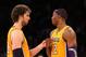 LOS ANGELES, CA - NOVEMBER 20: Pau Gasol #16 and Dwight Howard #12 of the Los Angeles Lakers celebrate after the Lakers survive the last shot attempt by the Brooklyn Nets at Staples Center on November 20, 2012 in Los Angeles, California. The Lakers won 95-90. NOTE TO USER: User expressly acknowledges and agrees that, by downloading and or using this photograph, User is consenting to the terms and conditions of the Getty Images License Agreement. (Photo by Stephen Dunn/Getty Images)