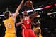 LOS ANGELES, CA - FEBRUARY 14: Josh Smith #5 of the Atlanta Hawks shoots over Pau Gasol #16 and Kobe Bryant #24 of the Los Angeles Lakers at Staples Center on February 14, 2012 in Los Angeles, California. The Lakers won 86-78. NOTE TO USER: User expressly acknowledges and agrees that, by downloading and or using this photograph, User is consenting to the terms and conditions of the Getty Images License Agreement. (Photo by Stephen Dunn/Getty Images)