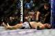 Apr 21, 2012; Atlanta, GA, USA; Chad Griggs is checked by an official in a heavyweight bout against Travis Browne during UFC 145 at Philips Arena. Travis Browne won in the first round by submission. Mandatory Credit: Paul Abell-USA TODAY Sports