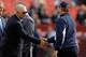 LANDOVER, MD - NOVEMBER 20: Dallas Cowboys owner Jerry Jones (L) shakes hands with head coach Jason Garrett (R) before the start of the Cowboys game against the Washington Redskins at FedExField on November 20, 2011 in Landover, Maryland. (Photo by Rob Carr/Getty Images)