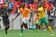 PORT ELIZABETH, SOUTH AFRICA - NOVEMBER 12: Yaya Toure of Cote D'Ivoire (L) and Kagisho Dikgacoi of Bafana Bafana in action during the Nelson Mandela Challenge match between South Africa and Ivory Coast at Nelson Mandela Bay Stadium on November 12, 2011 in Port Elizabeth, South Africa. (Photo by Richard Huggard/Gallo Images/Getty Images)